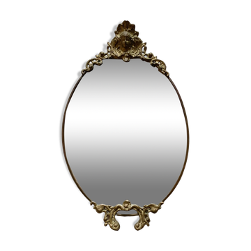 Antique oval brass crest mirror, 41x26 cm
