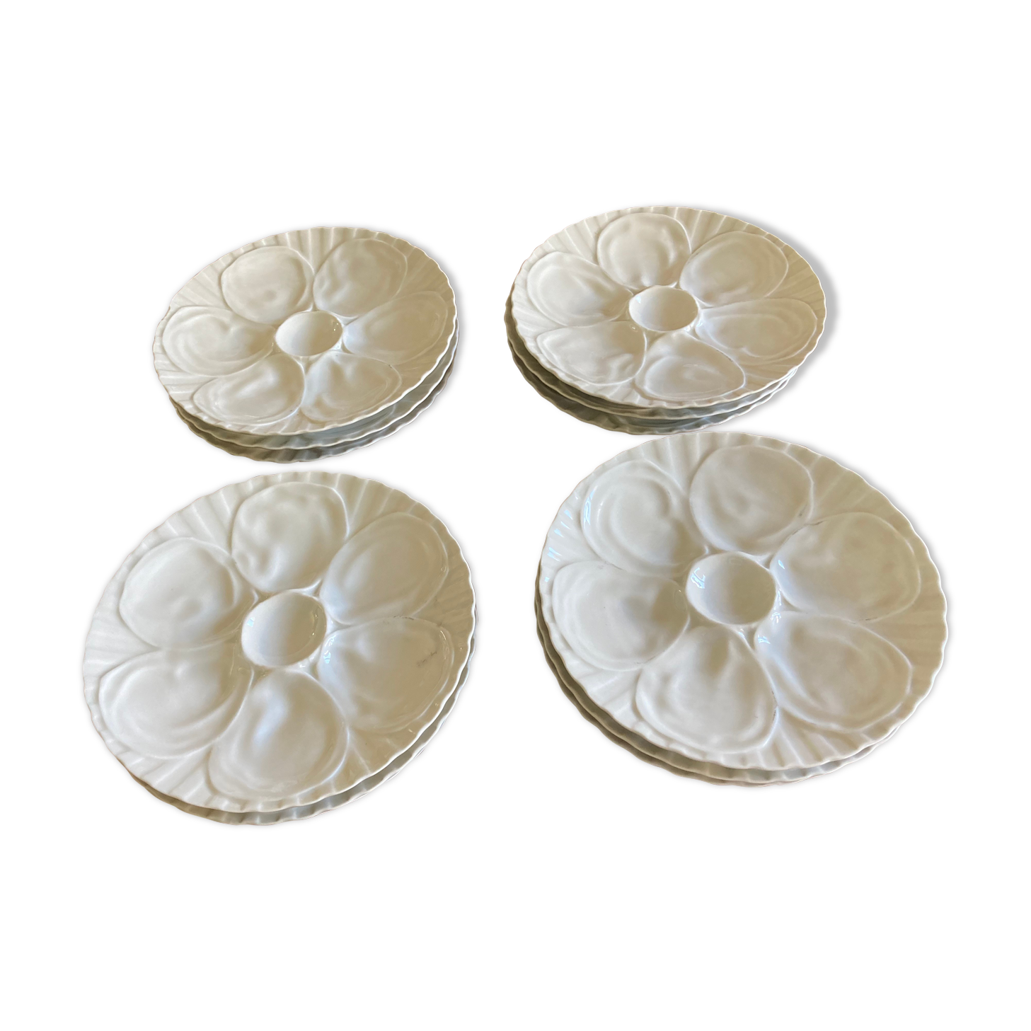 Series of 12 oyster plates