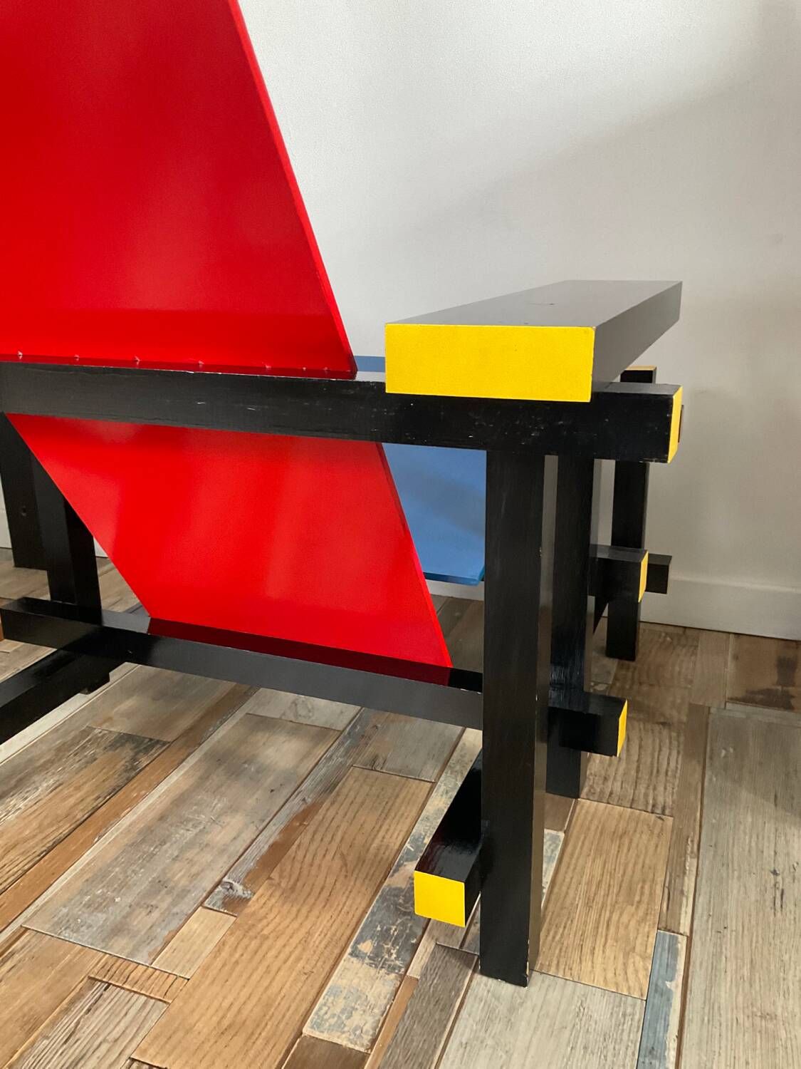 “Red and blue” lounge chair in the style of Gerrit Rietveld