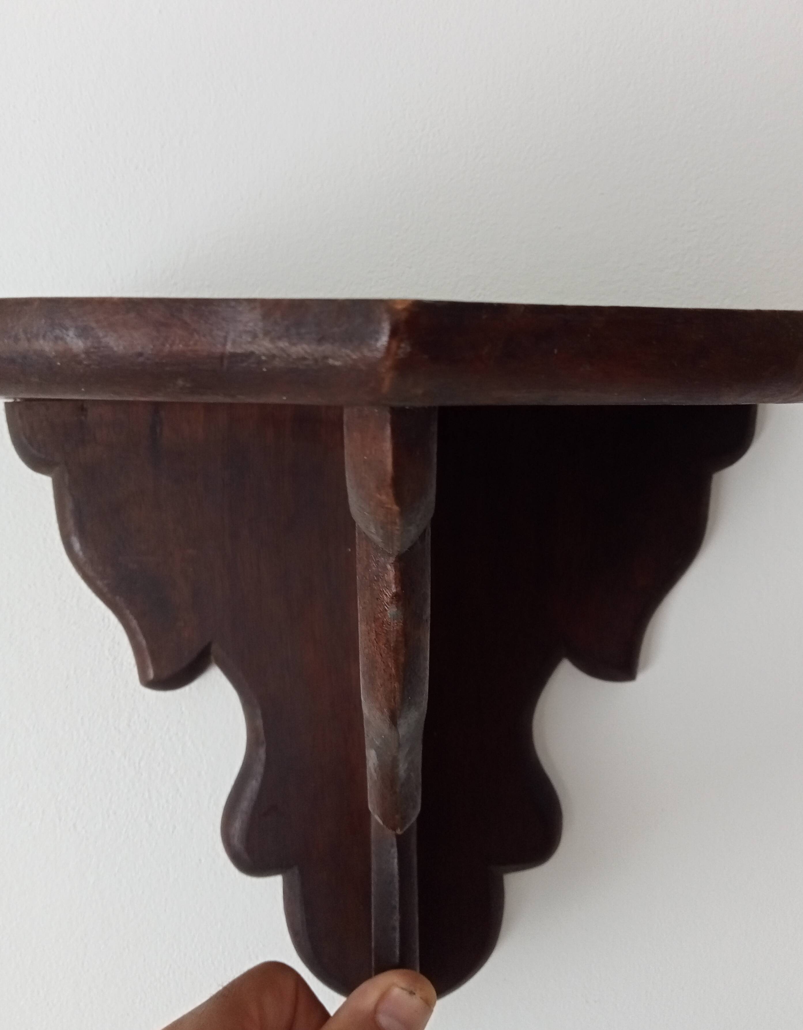 Pair of antique carved wooden shelves