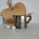 Old silver and wood teapot