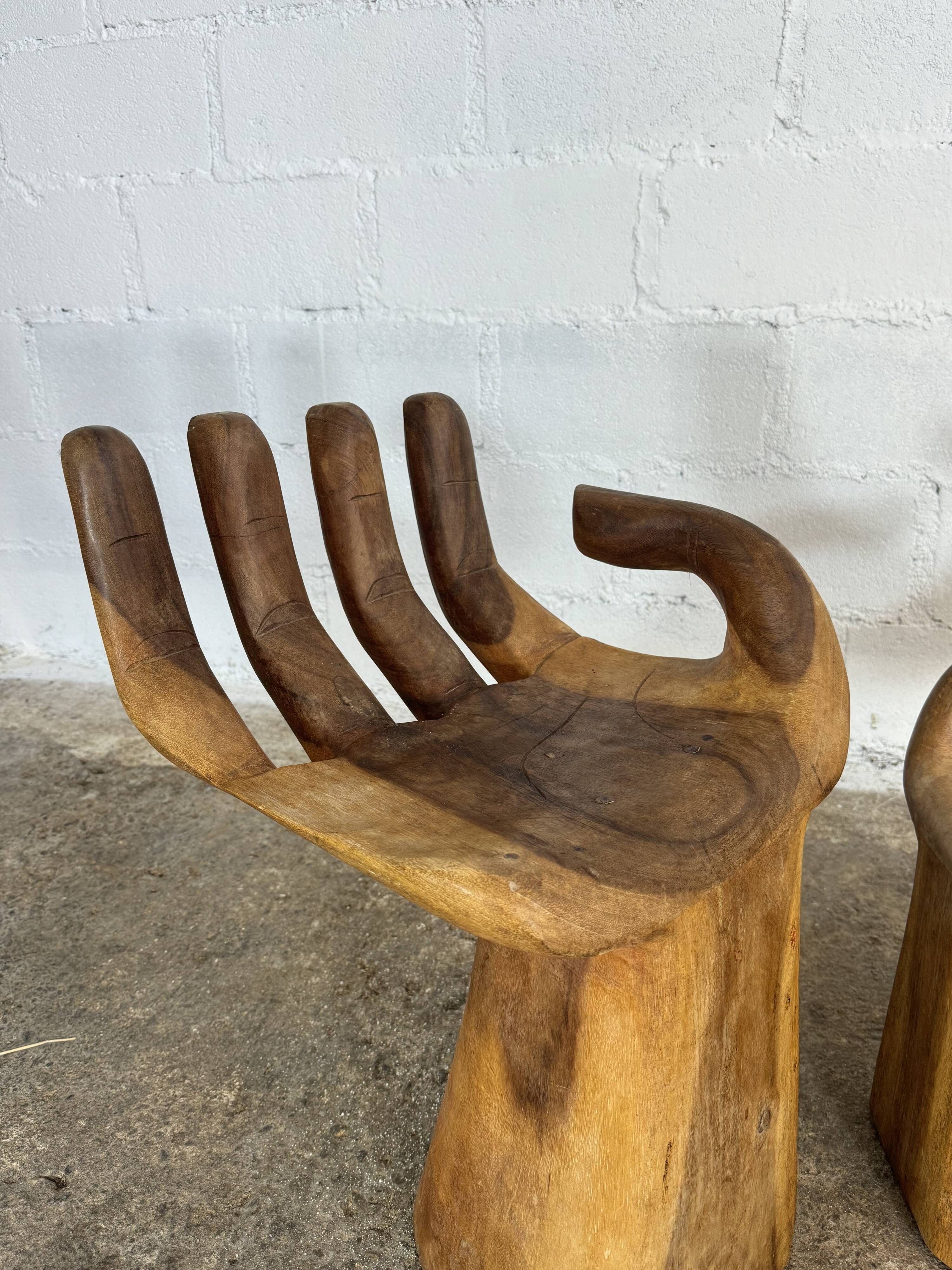Hand carved chairs in the Pedro Fiedeberg style