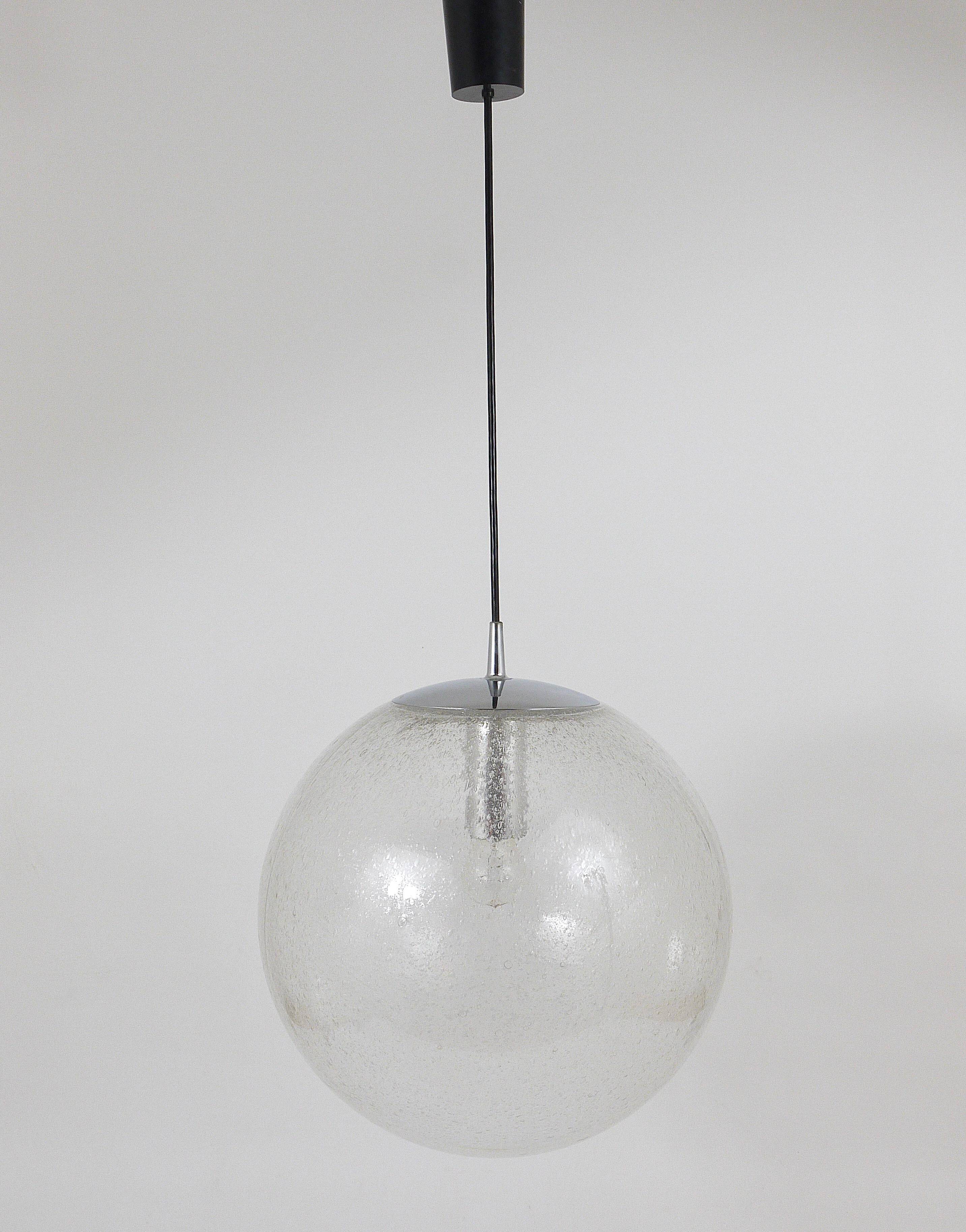 Large glass globe pendant light with bubbles and chrome by Peil & Putzler, Germany, 1970s.