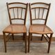Set of 2 antique wooden bistro chairs canned seats
