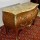 Louis XV chest of drawers, cubed rosewood marquetry, gilded bronzes, veined marble.
