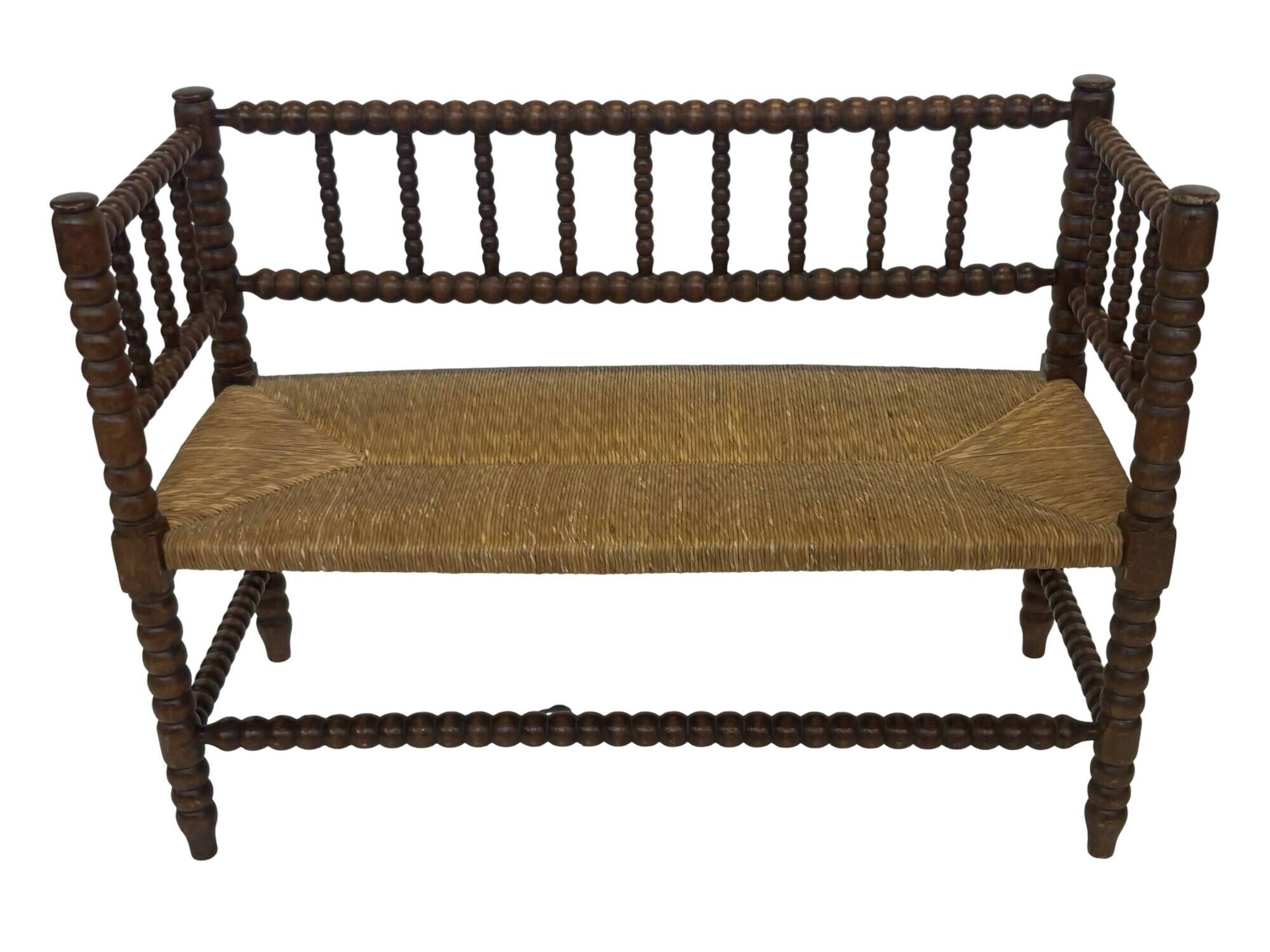 Vintage 'bobbin' bench with a rush seat, 1920s design with armrests.
