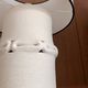 Table lamp in ceramic with a handmade couture-style lampshade from France.