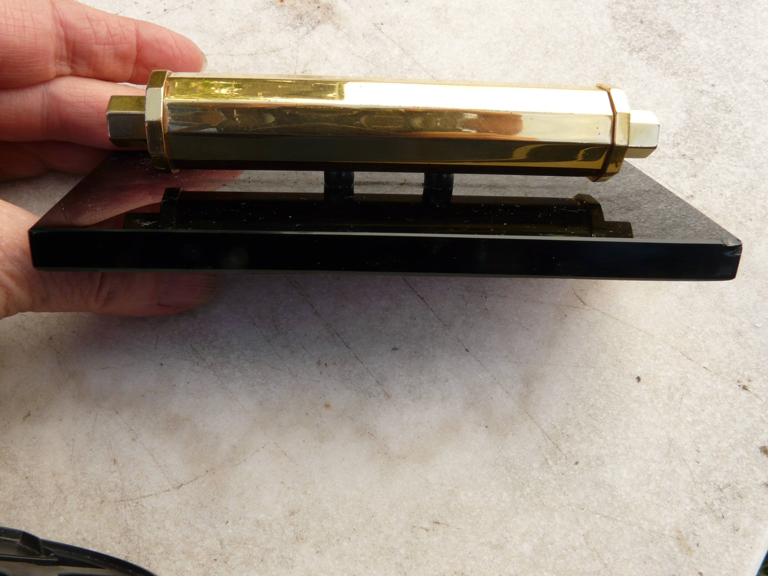 Tubular gold starry perpetual calendar, black base, 1950s