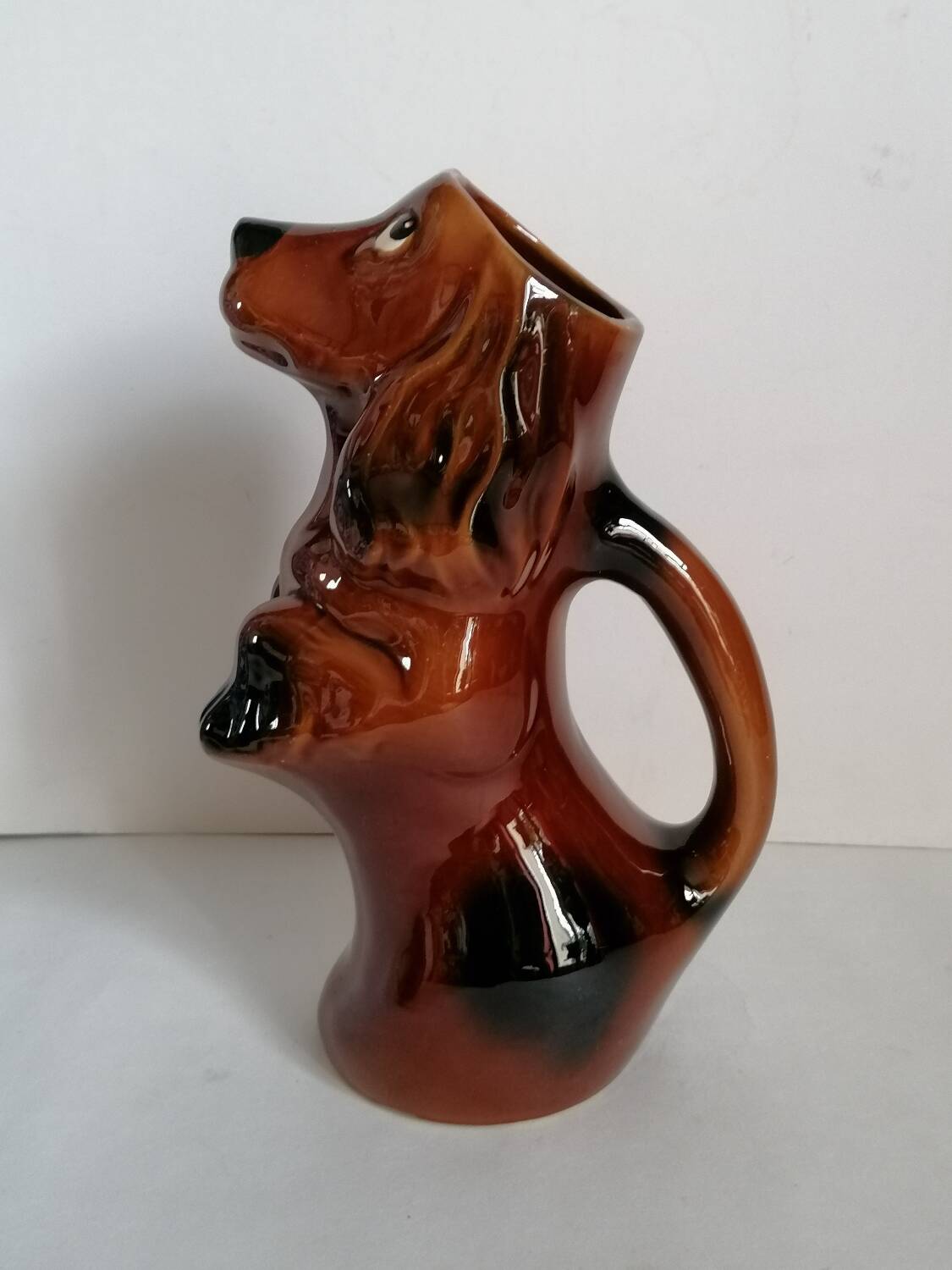 Zoomorphic dachshund dog pitcher in majolica slip