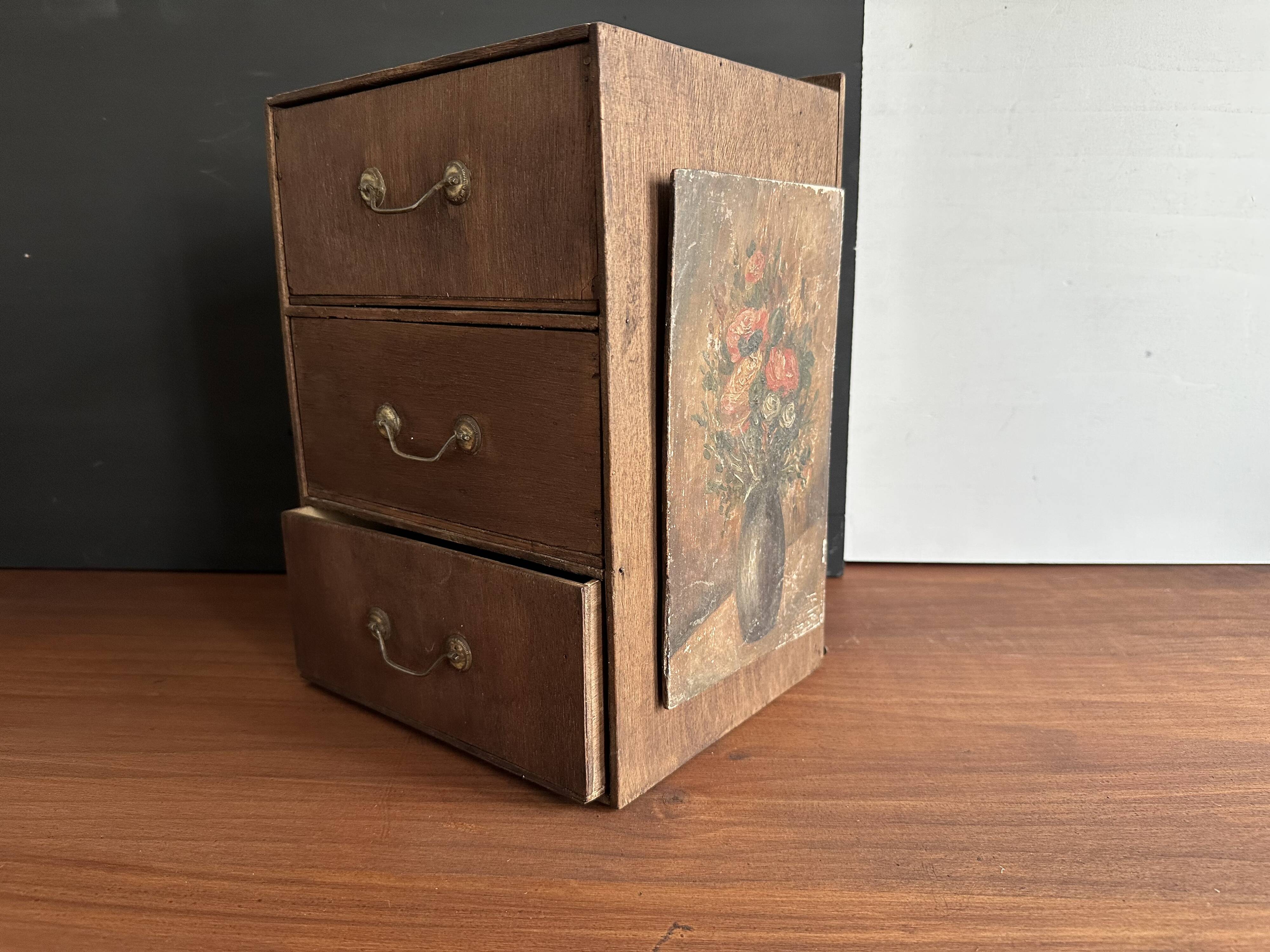 Small antique wooden drawer unit with floral painting, 1900.