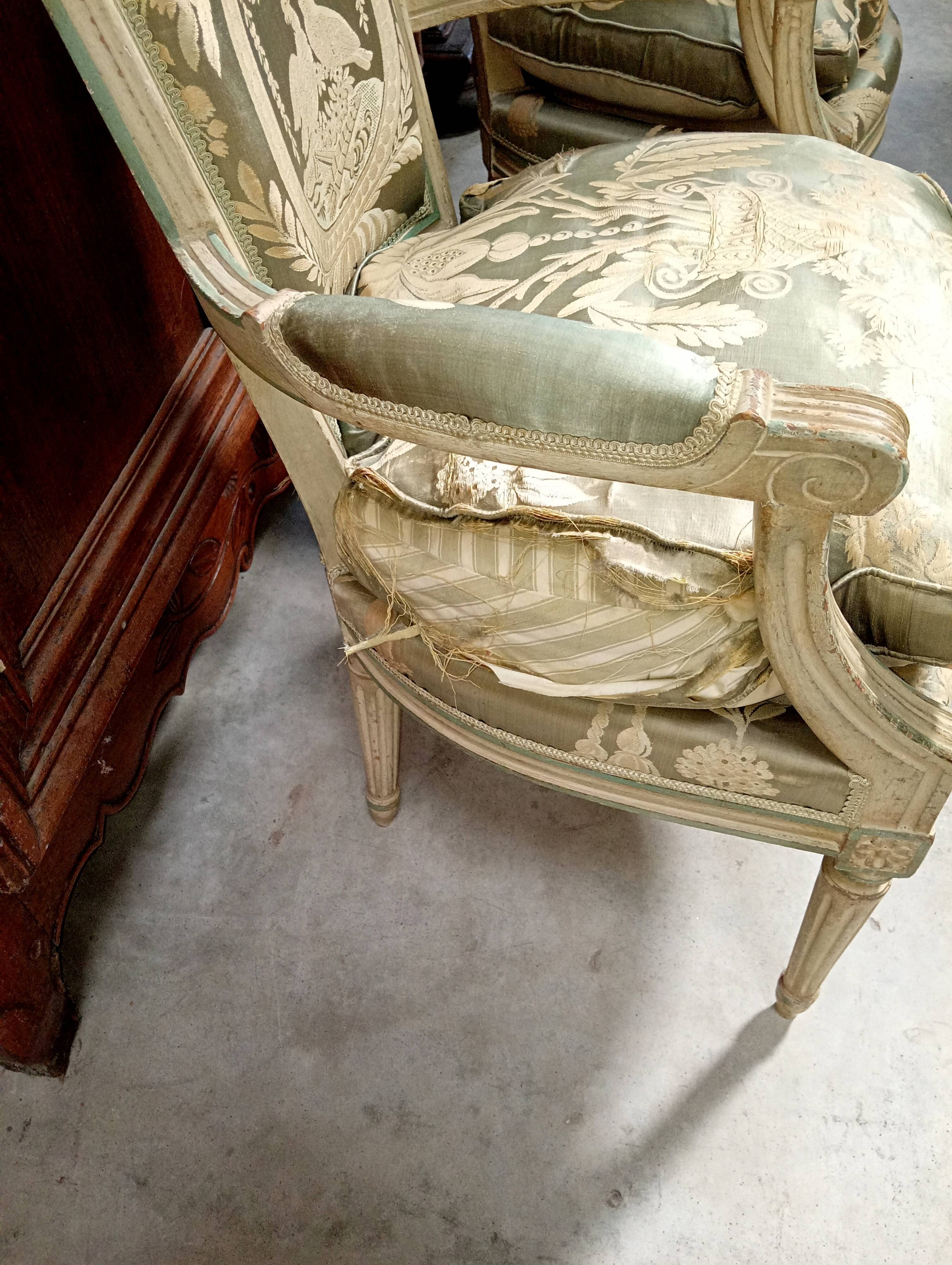 Pair of large Louis XVI armchairs in water green and cream wood.