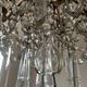 Grand chandelier in Louis XV style with crystal pendants.