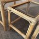Trio of vintage pull-out tables in rattan and smoked glass 70s