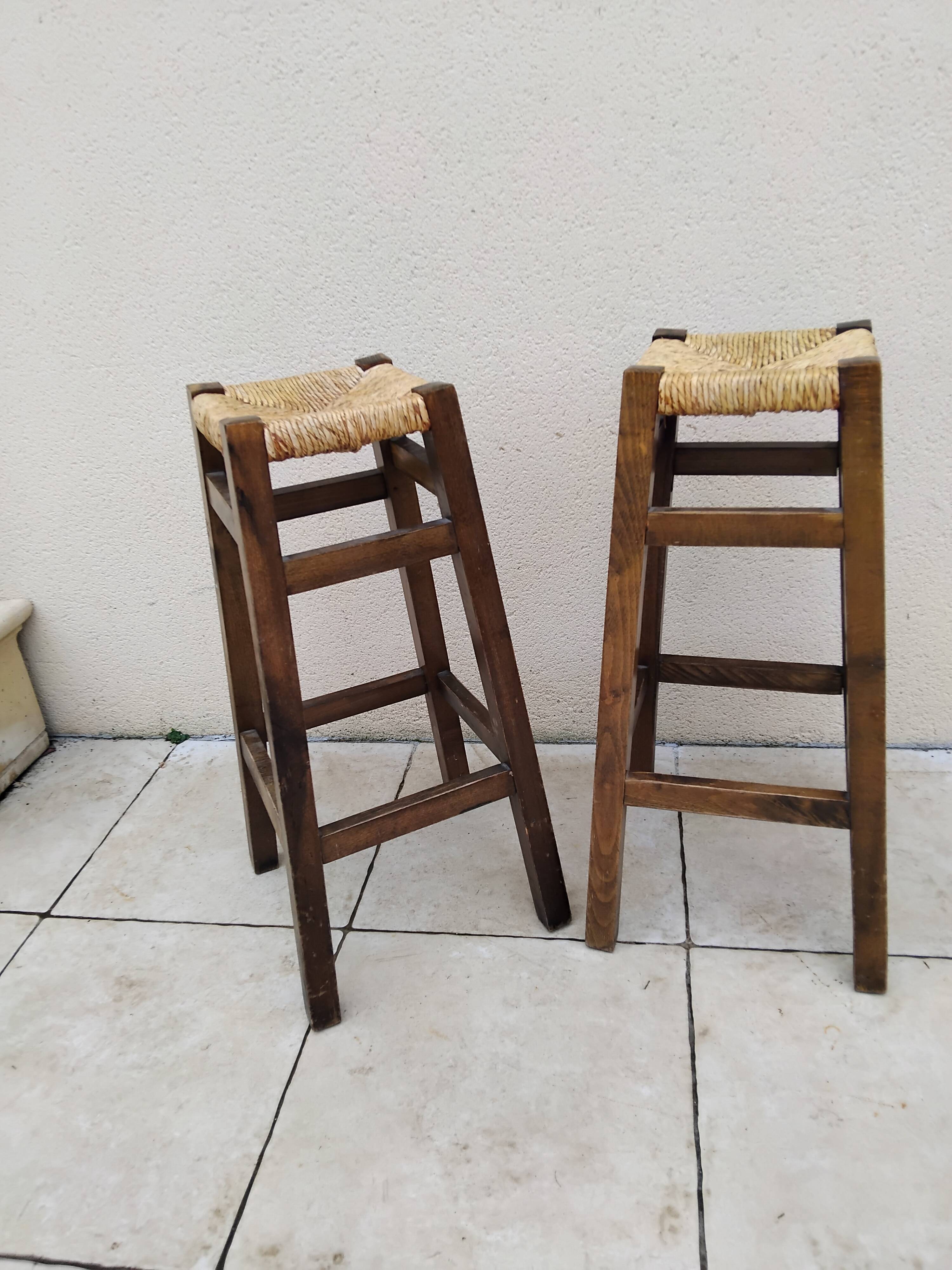 Pair of vintage stools with straw seats