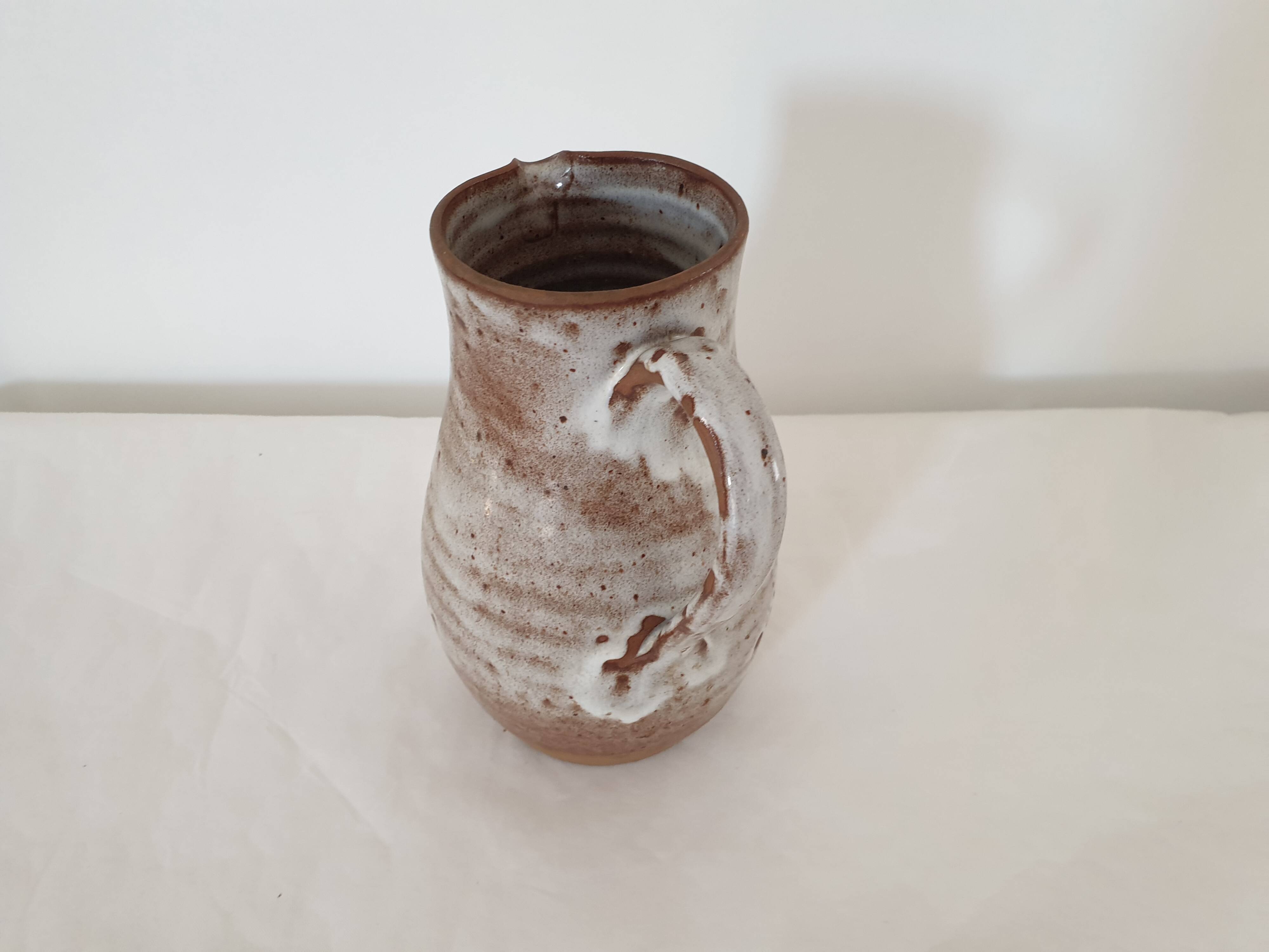 Ceramic pitcher signed Roger Jacques (Saint Amand)