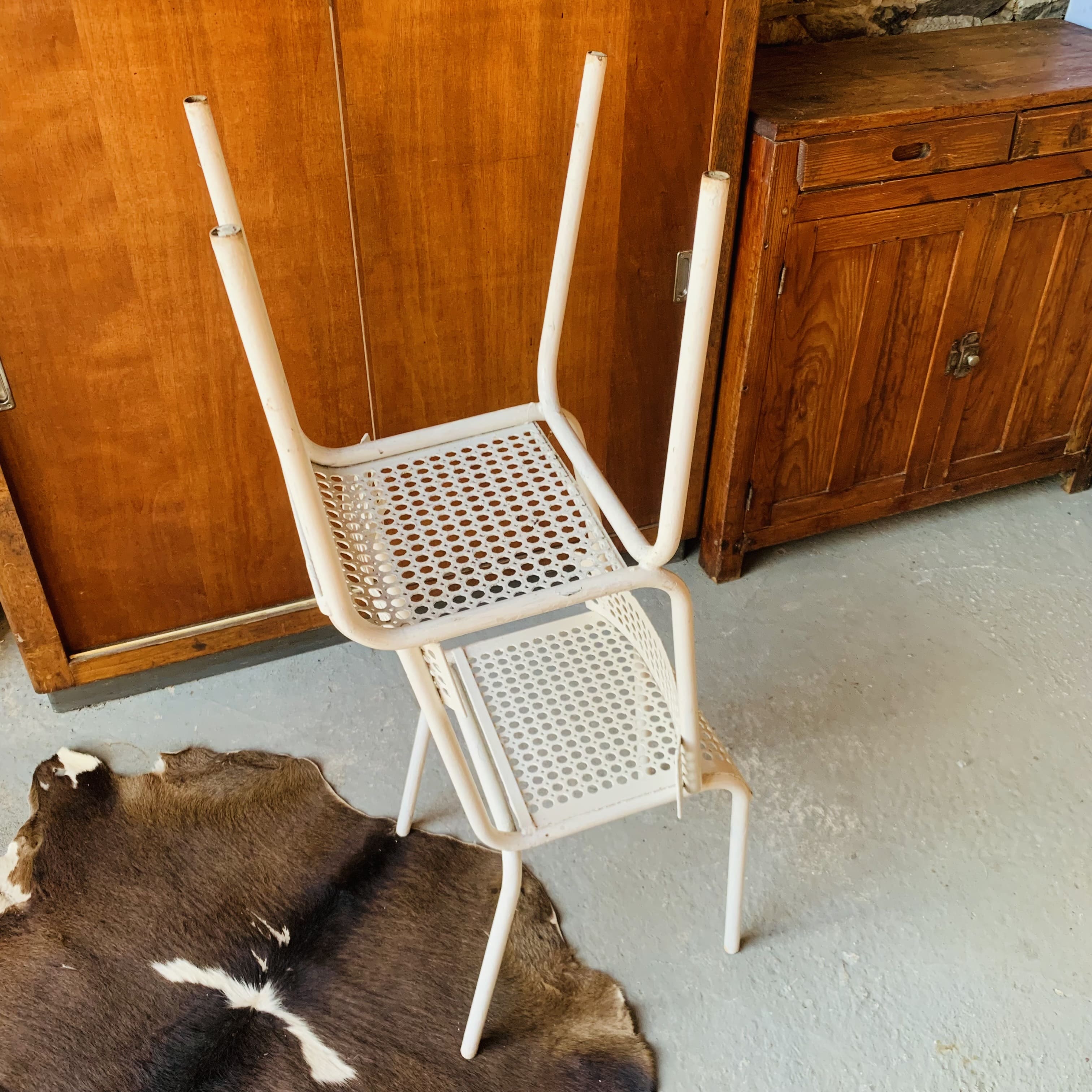 Series of 3 perforated metal chairs