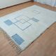 Handmade natural wool rug, size 150 x 250 cm