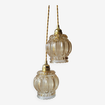 Duo of molded glass pendant lights