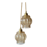 Duo of molded glass pendant lights