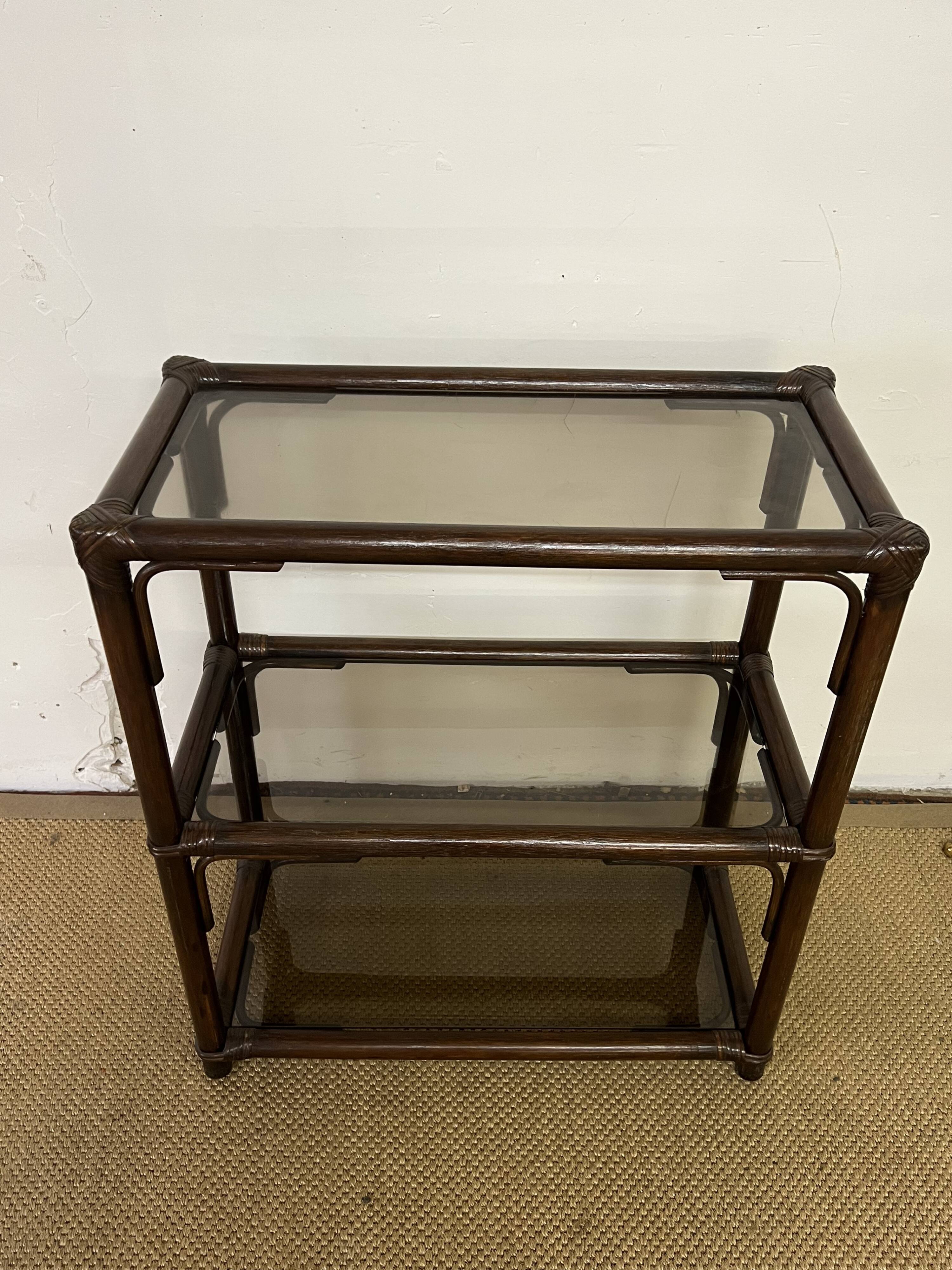 Rattan and smoked glass bookcase shelf