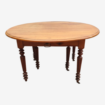 Table ovale 6 pieds avec allonges patine caramel