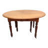 6-foot oval table with caramel patina extensions