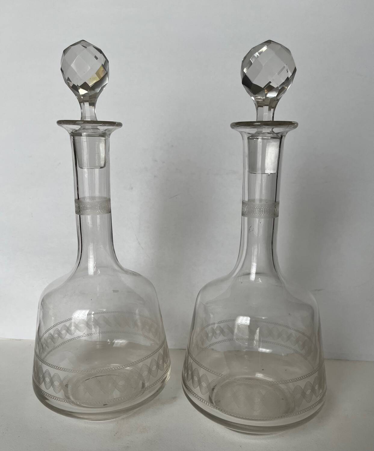 Pair of engraved crystal decanters