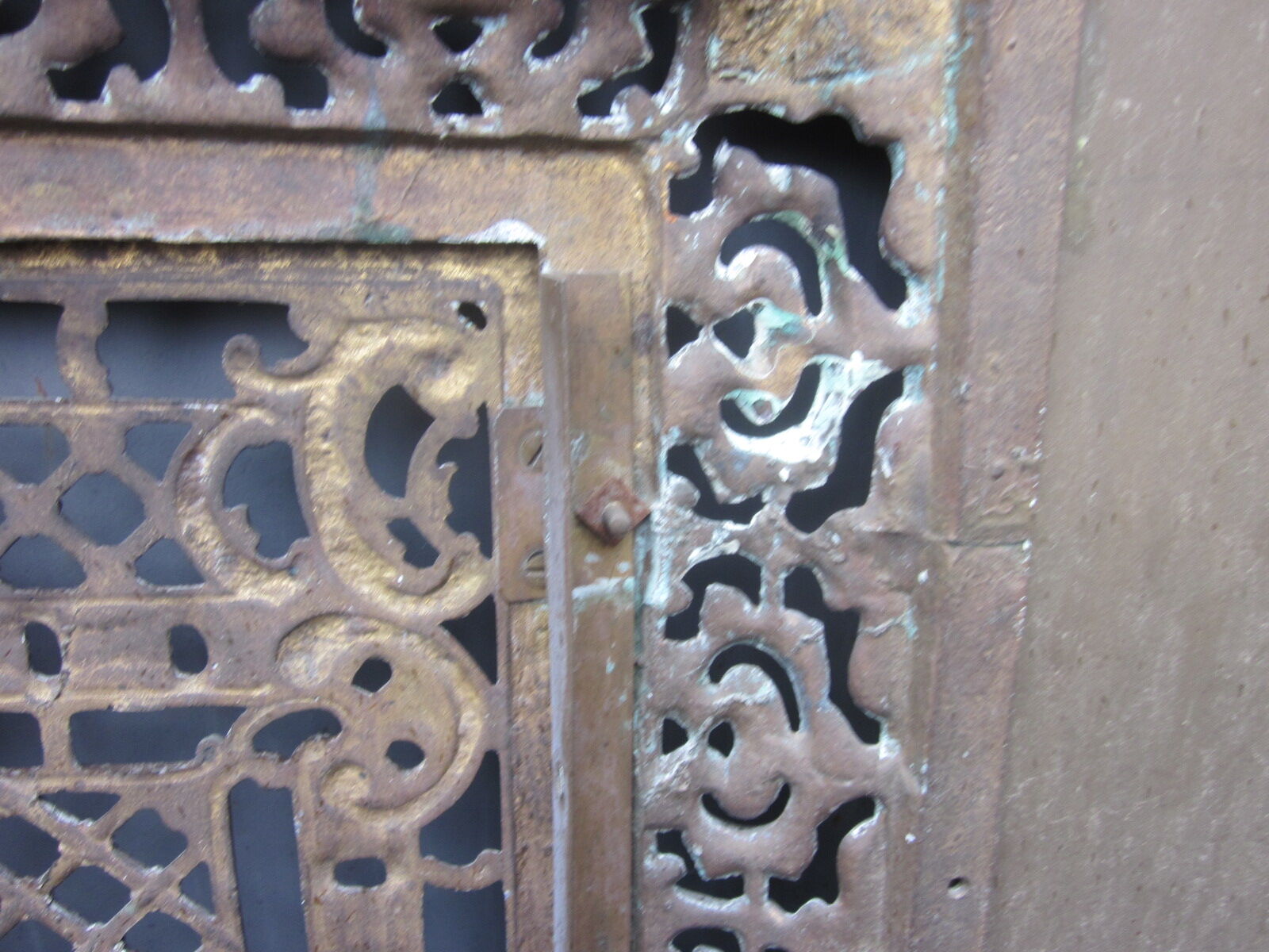 Front of the old fireplace all in bronze