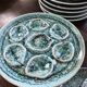 Set of 12 plates and an oyster dish or other in majolica.