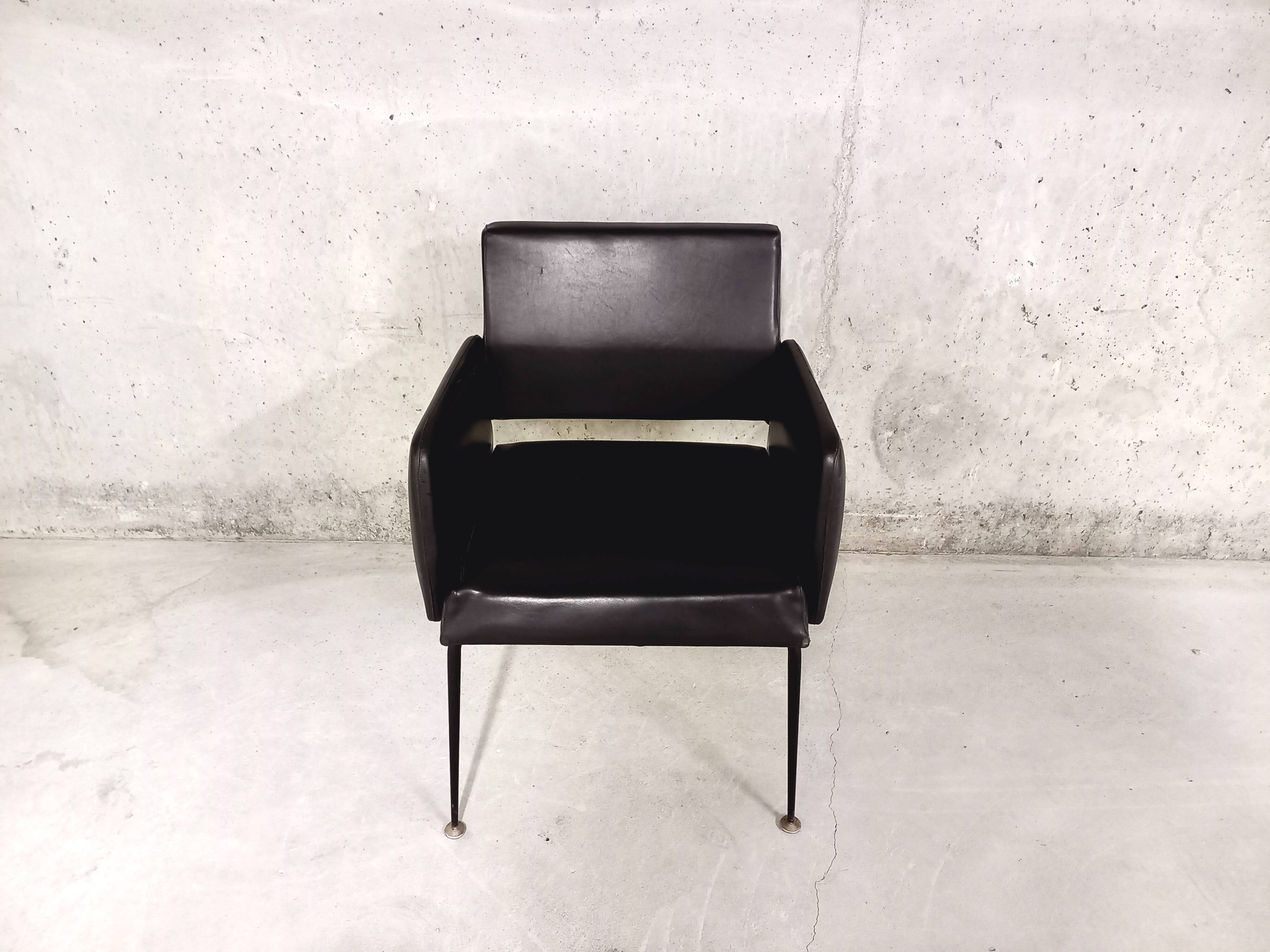 Vintage armchair in skai and black metal 60s