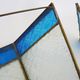 Pair of oriental triangle wall lights in copper and transparent and blue glass. 1970s