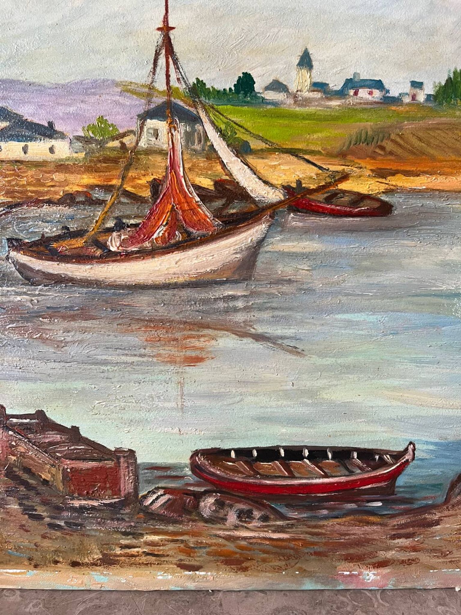 Bateaux au petit port, signé F. Lombard