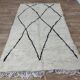 Handcrafted moroccan berber rug 243 x 143 cm