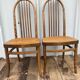 Paire chaise ancienne Baumann modèle eden bois + assise cannée vintage