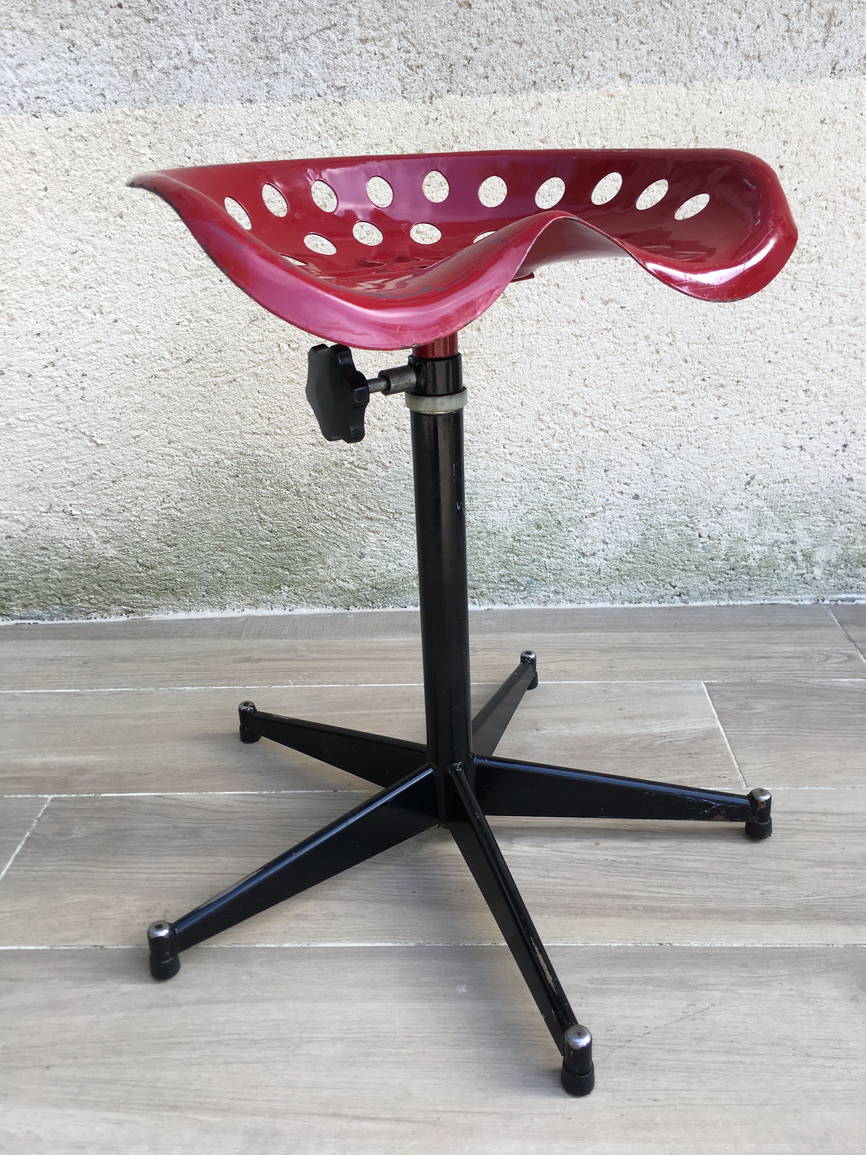 Vintage high stool sitting tractor