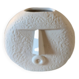 Stylized face biscuit vase