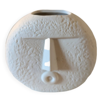 Stylized face biscuit vase