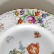 Paire d'assiettes fleuries porcelaine allemande