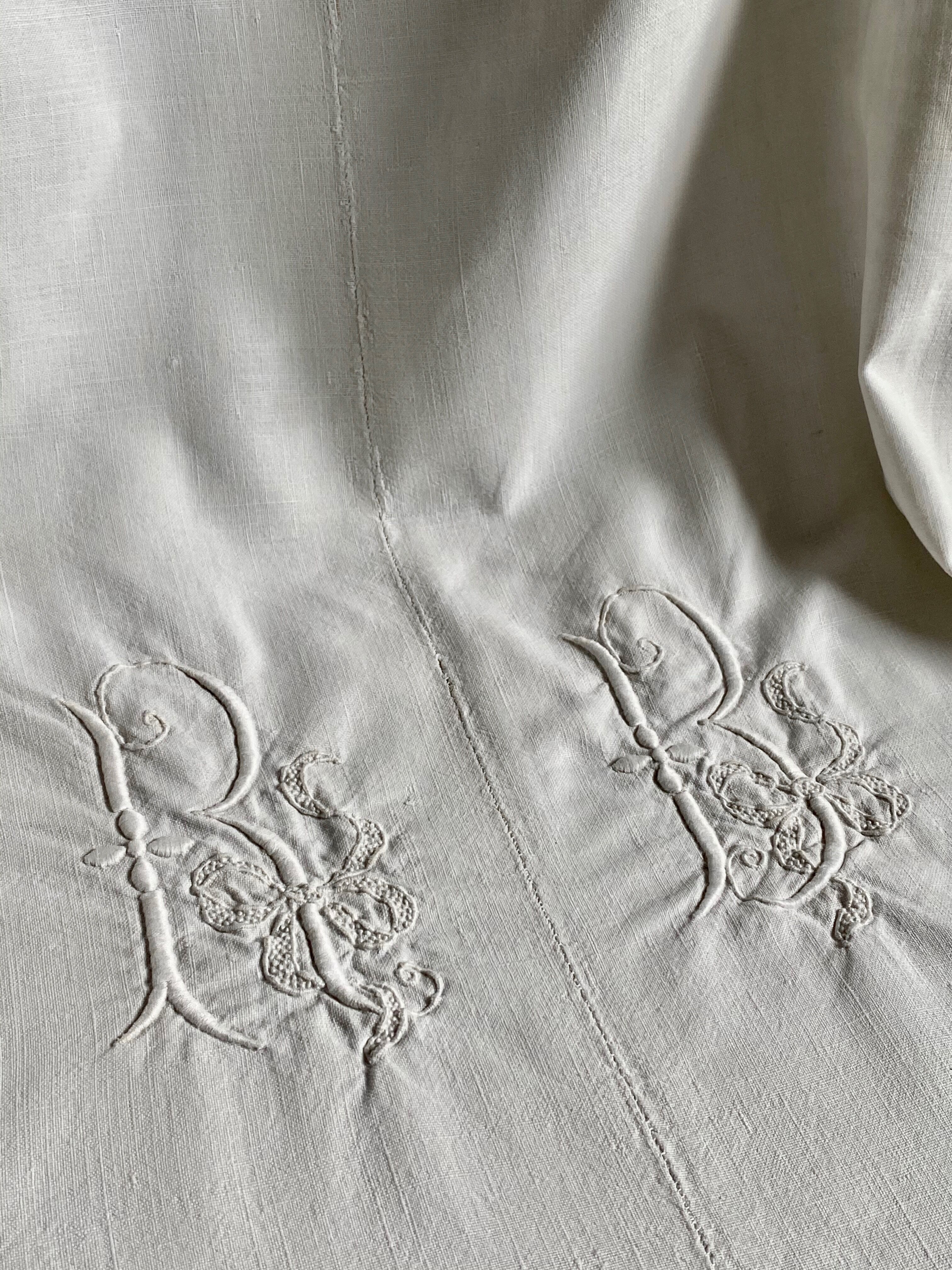Old sheet with monogram