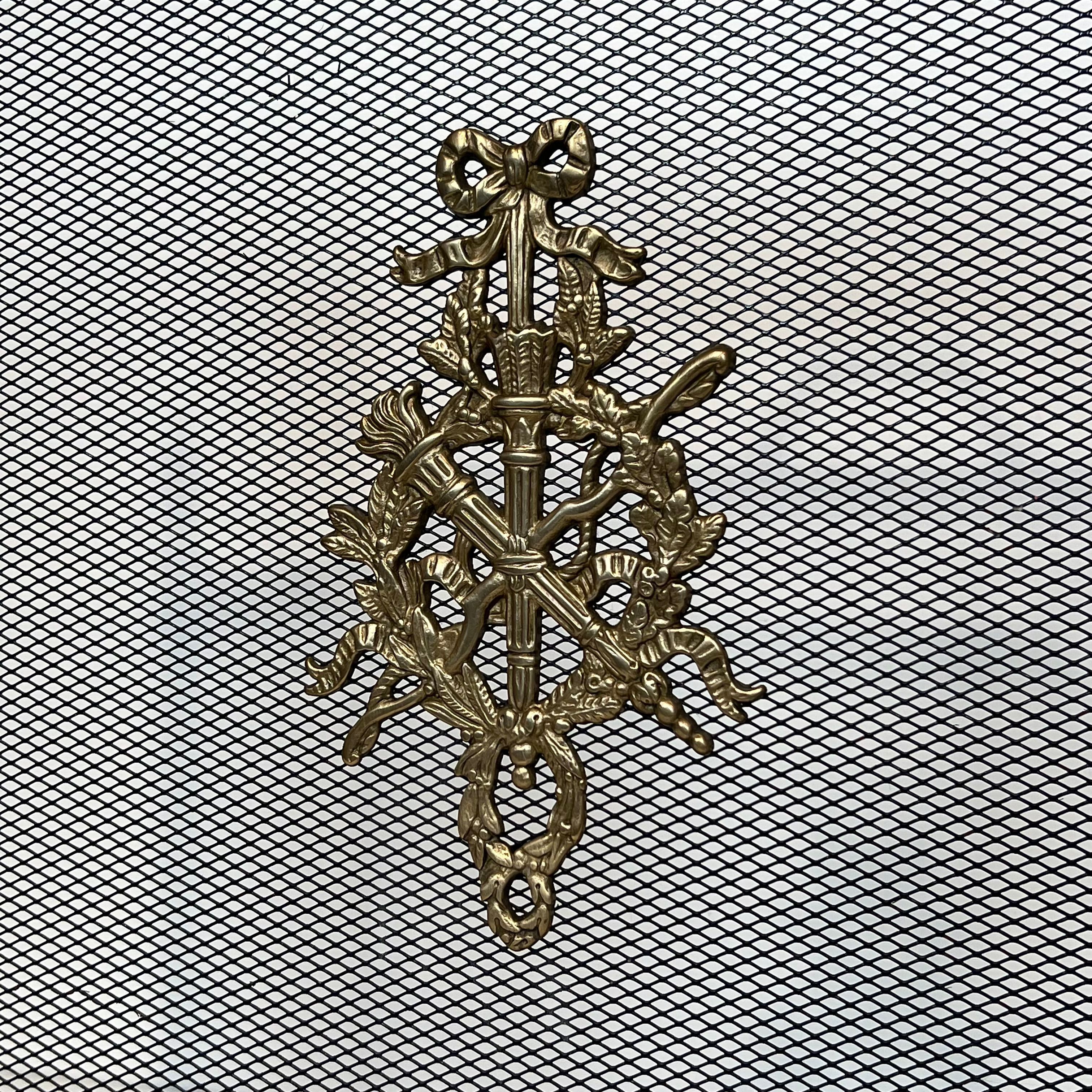 Brass fire screen and grille in the Louis XVI style in the taste of Maison Jansen.