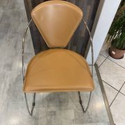 1 Linda armchair chair by Arrben in camel brown leather with a chrome steel frame.