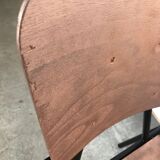 Old chair with armrest restored in metallic pink