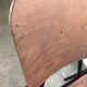 Old chair with armrest restored in metallic pink