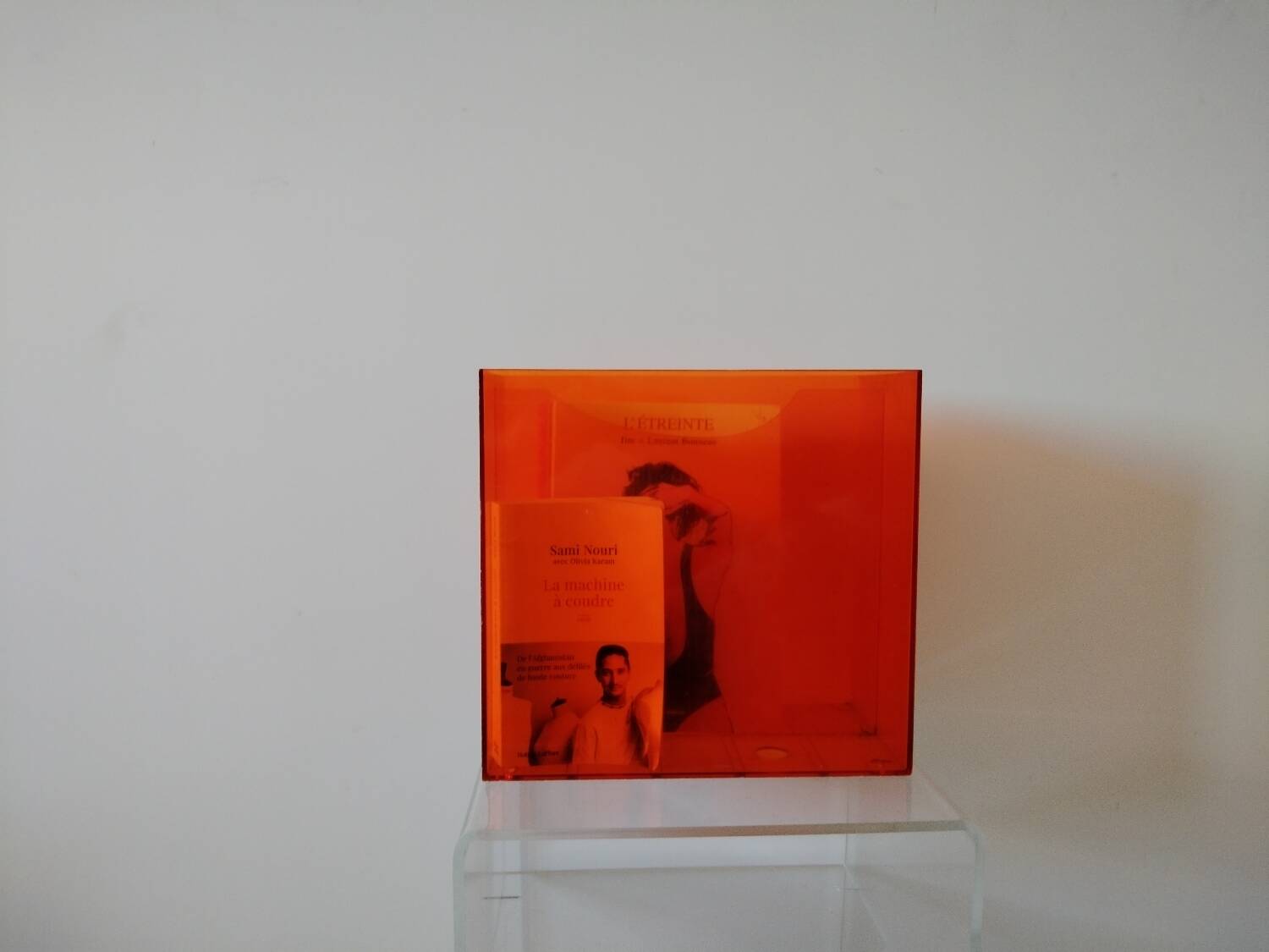 Vinyl magazine holder in orange plexiglass