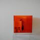 Vinyl magazine holder in orange plexiglass