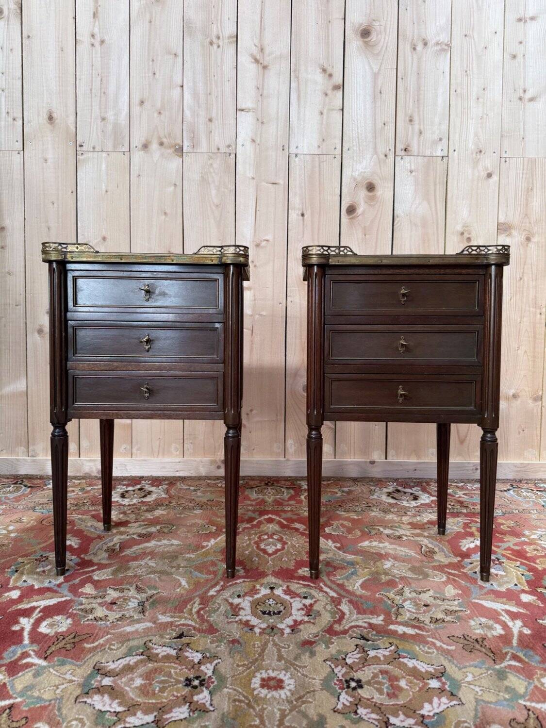 Pair of Louis XVI bedside tables in solid mahogany.
