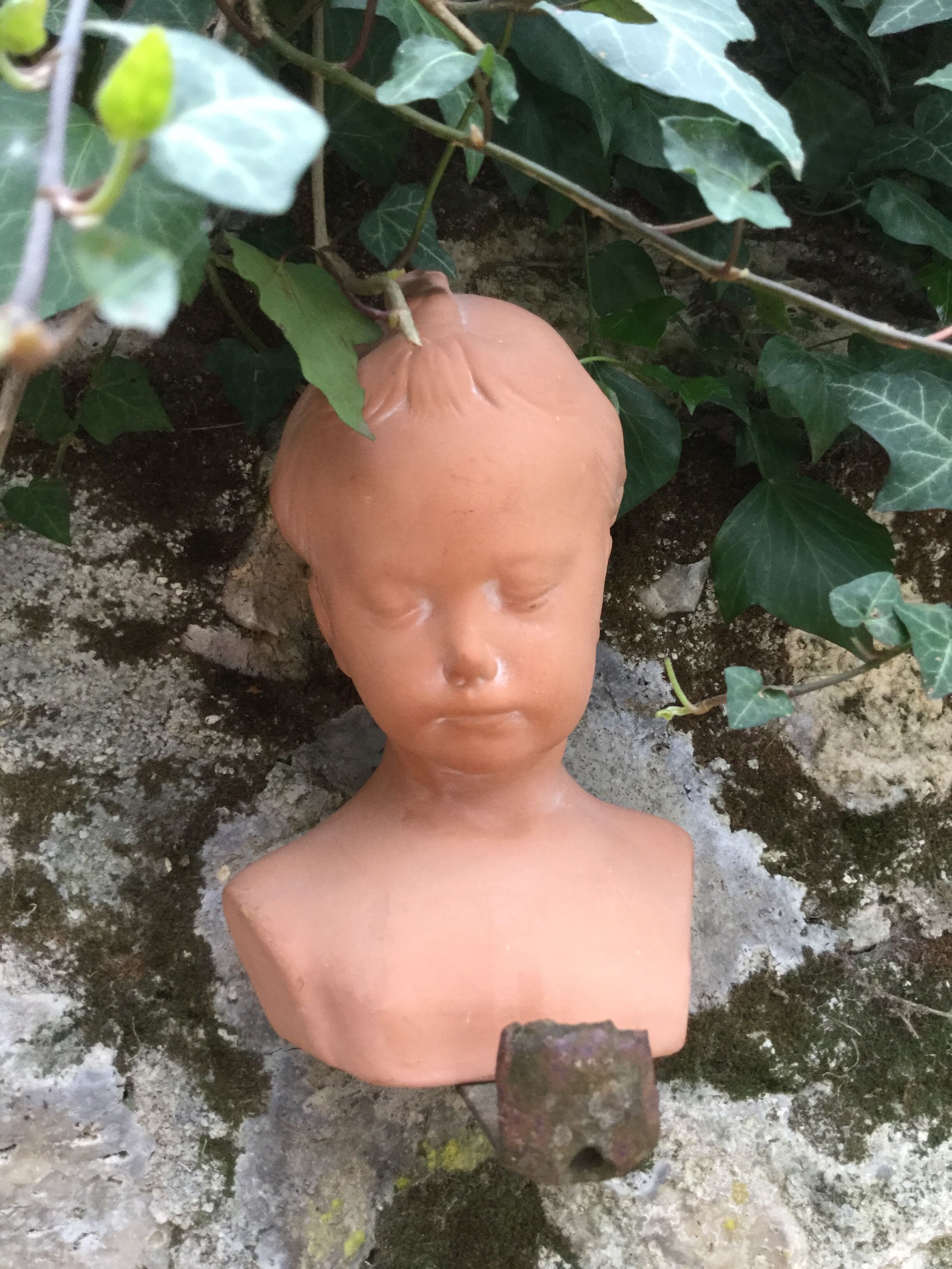 Child terracotta bust