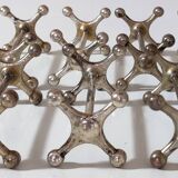 Set de 9 porte-couteaux "Atomium" en métal argenté