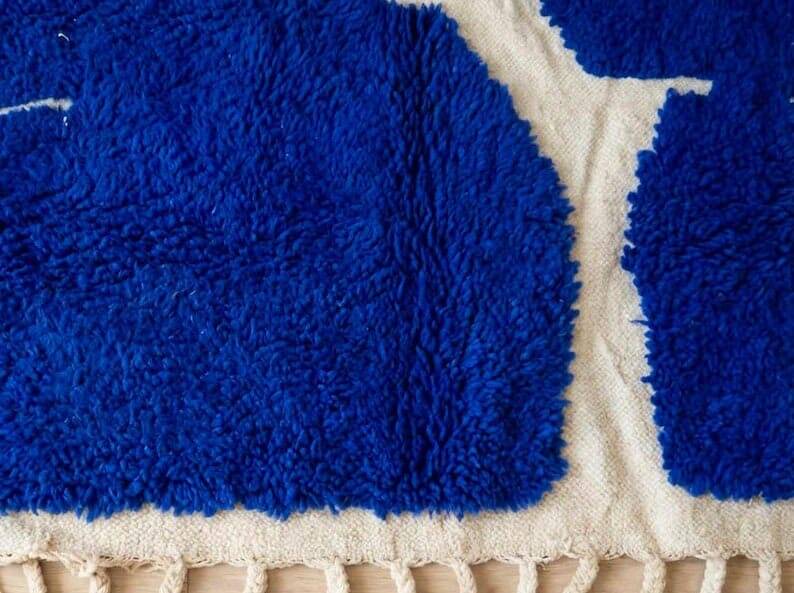 Handmade pure wool rug with blue patterns, 150/250 cm.