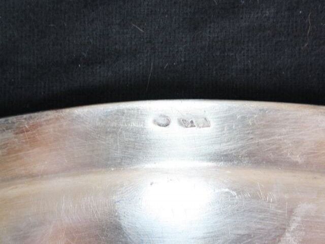 Flat oval silver metal